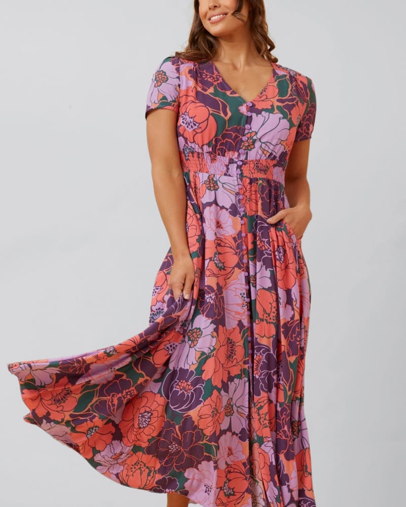 Front of a model wearing a size 2X Christina Maxi Dress Fit & Flare Floral Print in Purple by ANNICK. | dia_product_style_image_id:349583